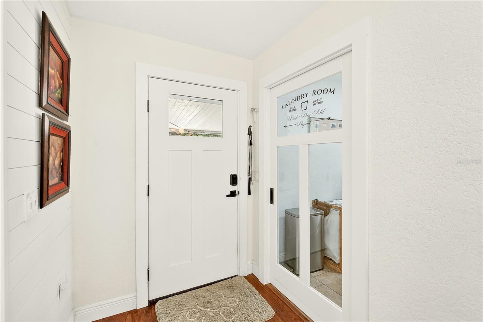 Back door to porch and entrance to Laundry Room