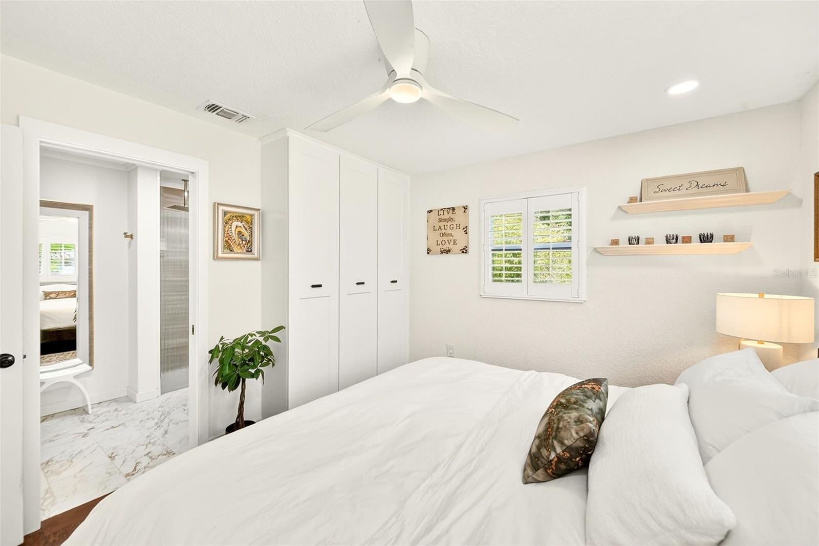Primary bedroom with built in closet