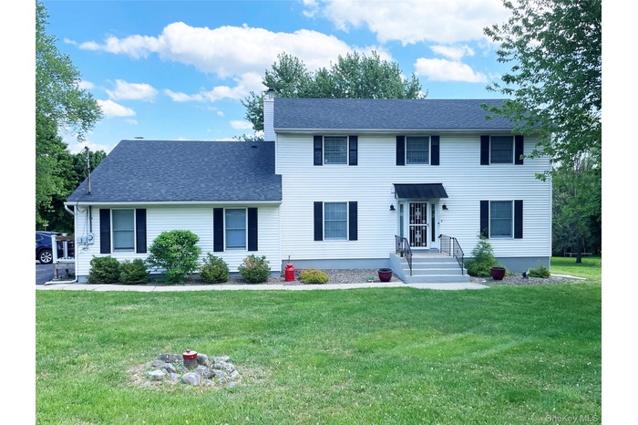 Classic center hall colonial including Guest Quarters with it's own entrance.
