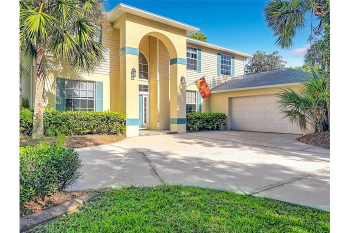 Grand entry and side-entry garage on a private 2.1-acre homesite