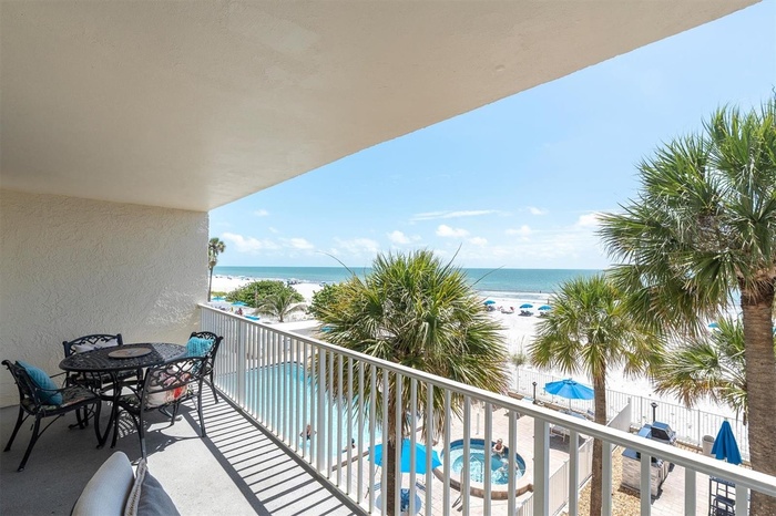 Large Balcony overlooking pool and beach