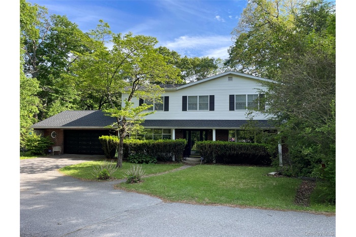 Nestled on a private .65 acre parcel.