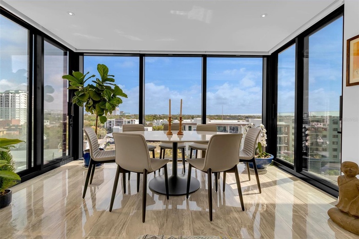 Beautifully Enclosed Lanai Showcasing City Views