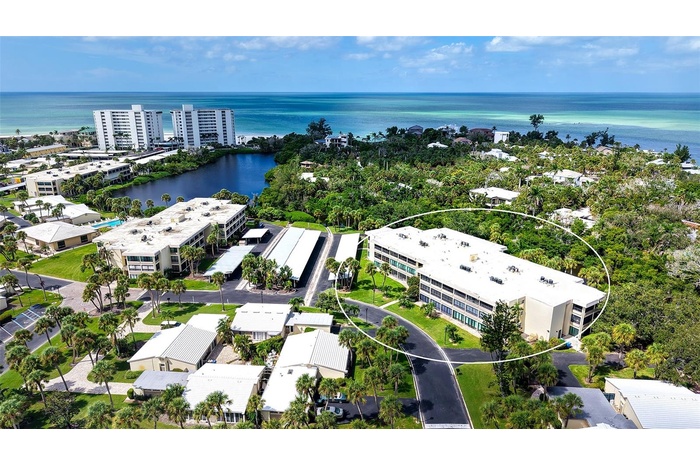 Aerial view of the Gulf front property of Whispering Sands!  225 Hourglass Way is circled.