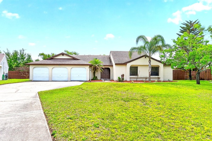 Welcome to this beautifully maintained 4-bedroom, 2-bath single-story home in the sought-after GOLF COMMUNITY of Orange Tree, where space, comfort, an