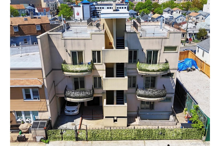View of property with a residential view