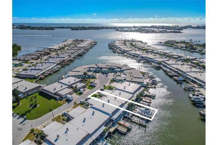 Enjoy a direct view of the wide canal and marina from your deck, perfect for sunset cocktails or early morning coffee as the boats pass by.