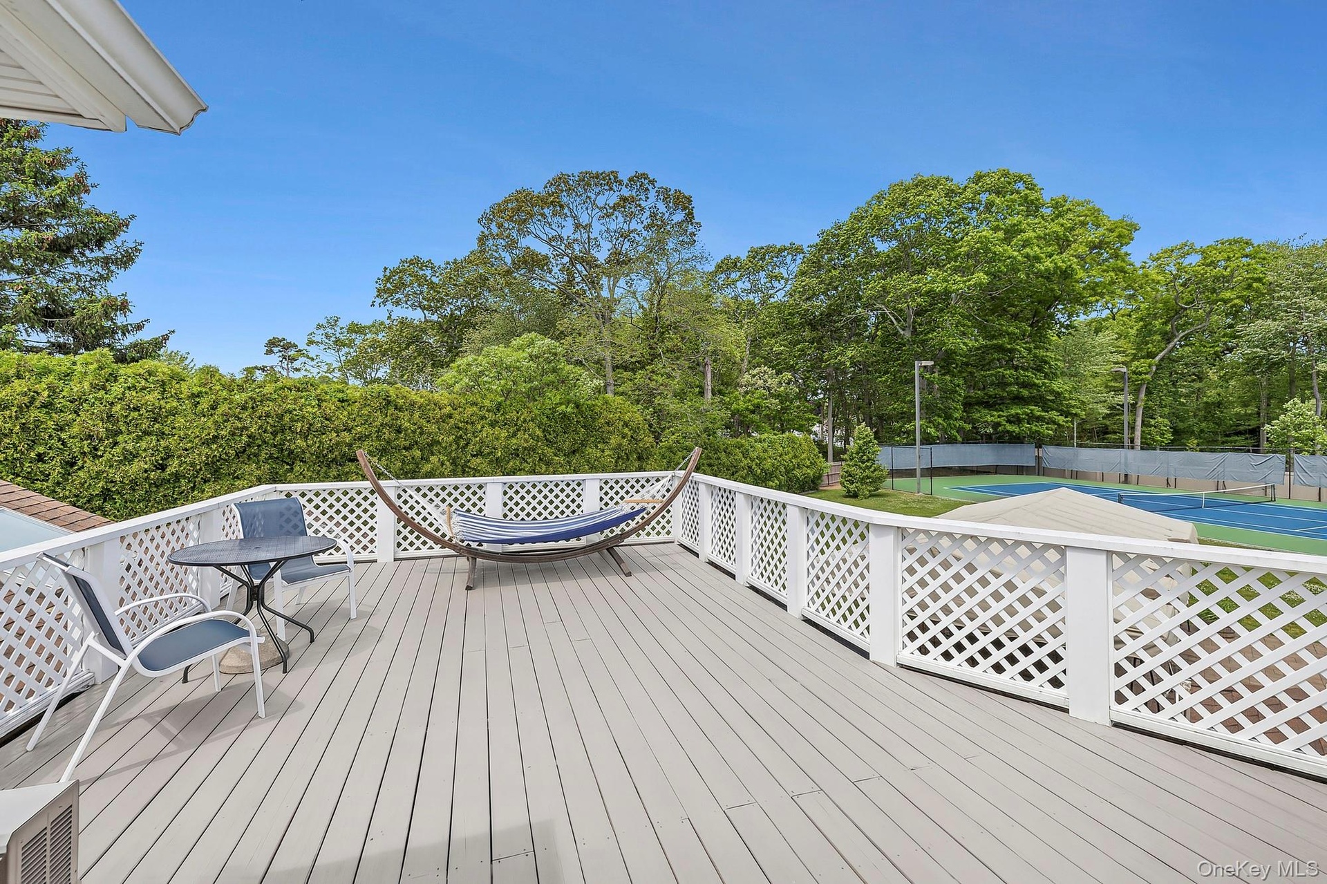 Rooftop Deck overlooking pool and tennis court