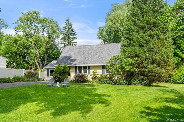 Welcome to 3 Jennifer Lane, a classic Cape Cod style home with timeless curb appeal in a convenient Hartsdale location.