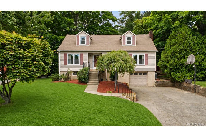 Welcome to 50 Larkspur!  Charming 4 Bedroom Cape style home