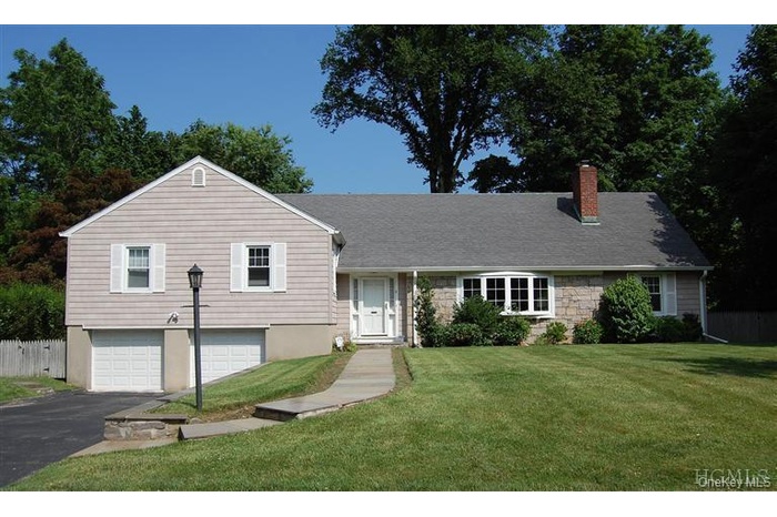 WALK TO TRAIN & VILLAGE!  Updated 5 bedroom, 4.1 bath renovated with new Granite Kitchen, new bathrooms.  Scarsdale schools: Greenacres elementary, Sc