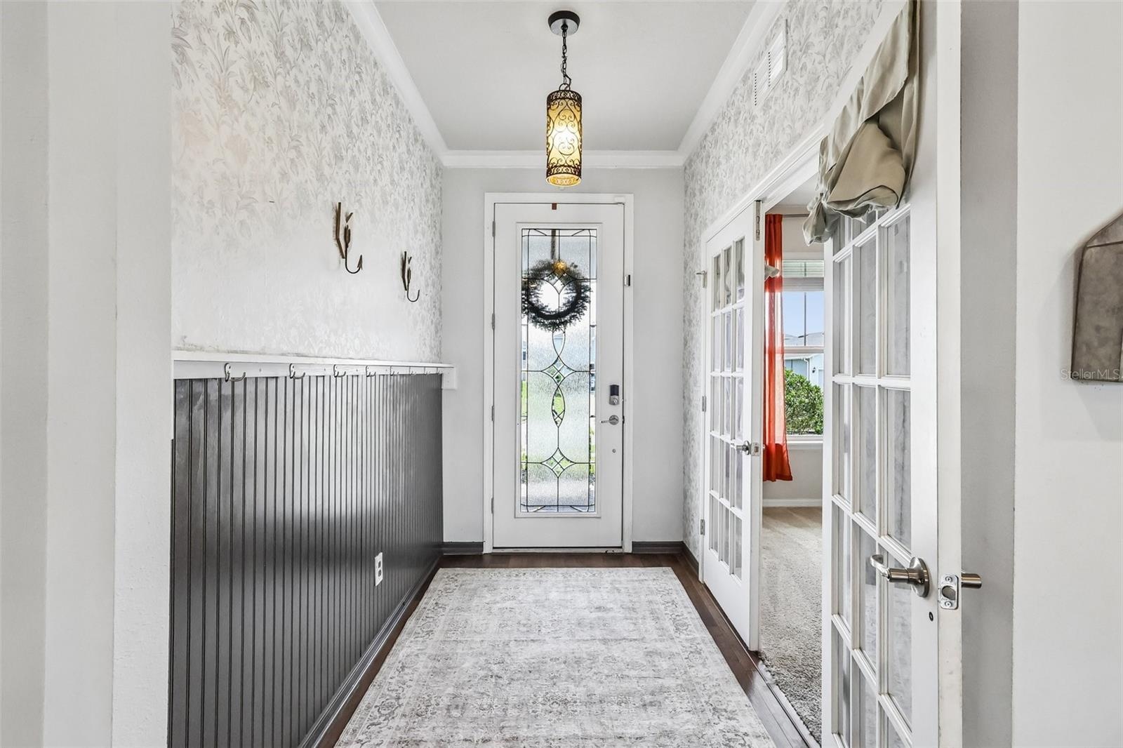 Foyer with Office French doors on right of view