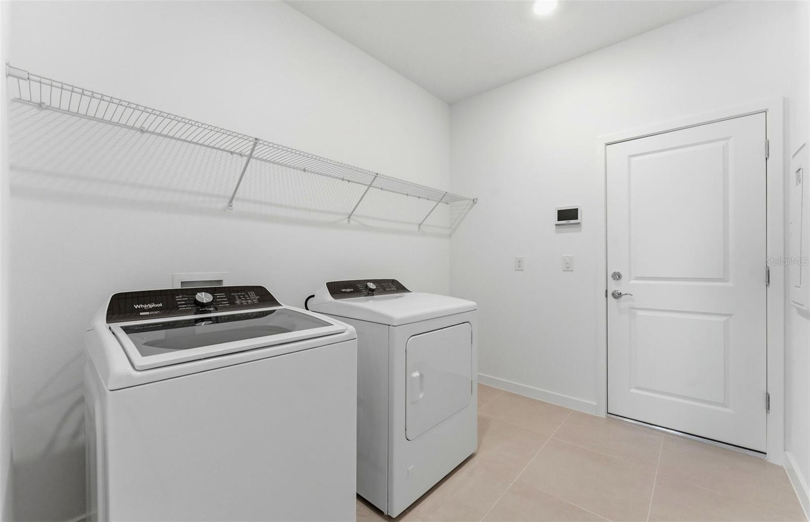Laundry Room w/Whirlpool Washer and Dryer