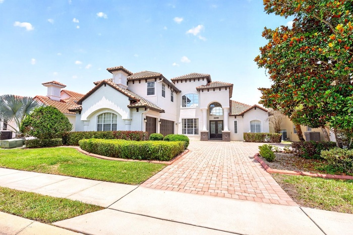Experience LUXURY LIVING in this stunning 5-bedroom, 4-bath estate home in the highly sought-after Greens at Providence, an impressive 24-HOUR GUARD-G