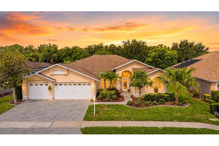 3-car garage and pavered driveway