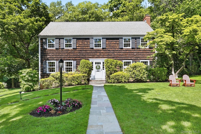 Welcome to 16 Old Farm Lane, a turn key classic Hamptons-style cedar shingle home!