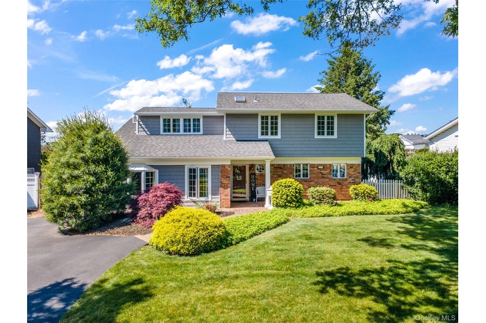 Beautiful Splanch with Updated Roof/Siding on .23 Acre Lot!