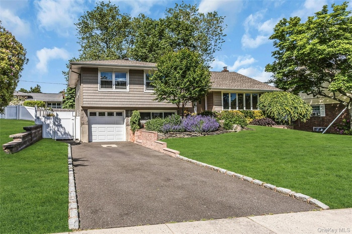 Seton Hills Split featuring a long driveway and paved Walkway Stones