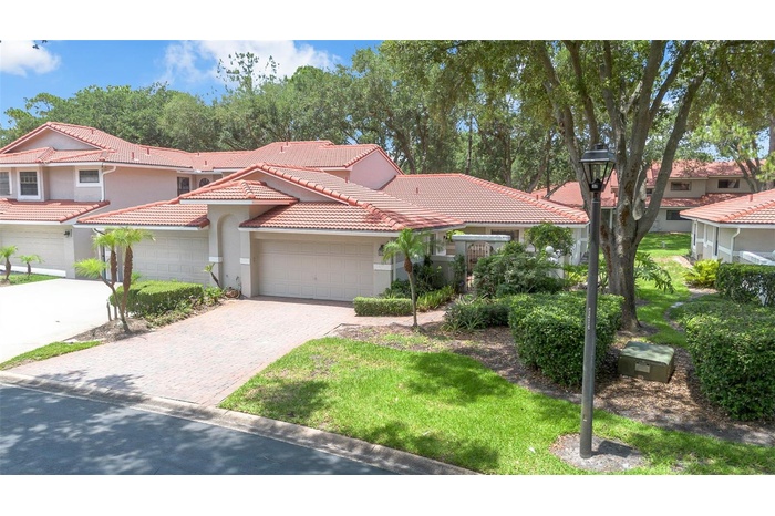Highly sought after single story end unit 3 bedrooms 2 baths Capri floor plan in desirable gated Sandpointe in the heart of Dr. Phillips.