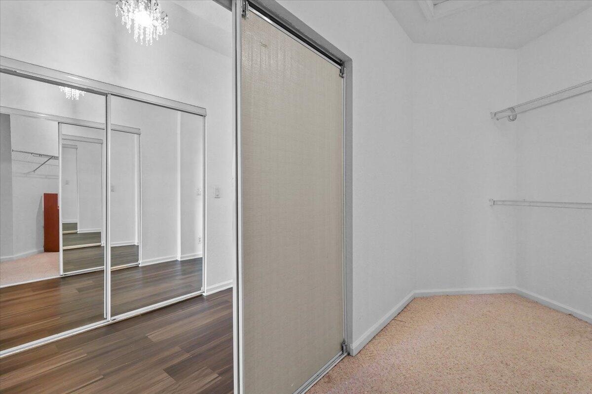 EN-SUITE WALK-IN CLOSET INSIDE THE MASTER BEDROOM SUITE ON SECOND FLOOR