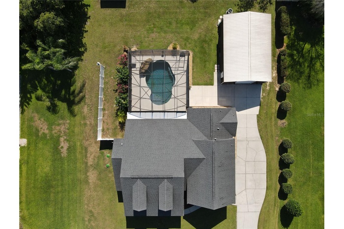 Pool home with giant workshop on a culdesac