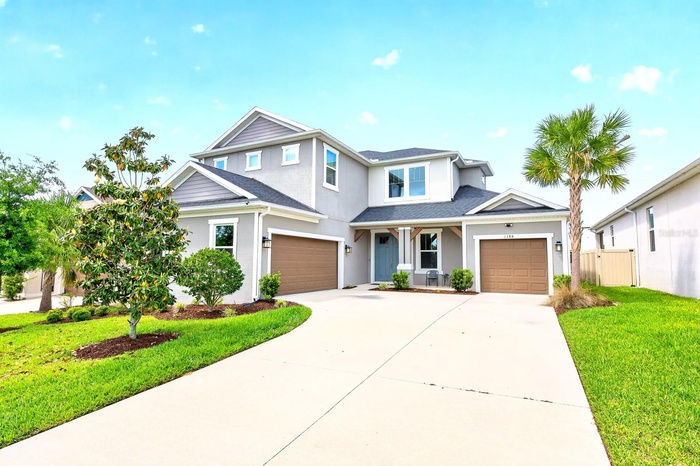 Welcome to this IMMACULATELY MAINTAINED 5-bedroom, 4.5-bath residence in the GATED LAKESIDE COMMUNITY of Apopka.