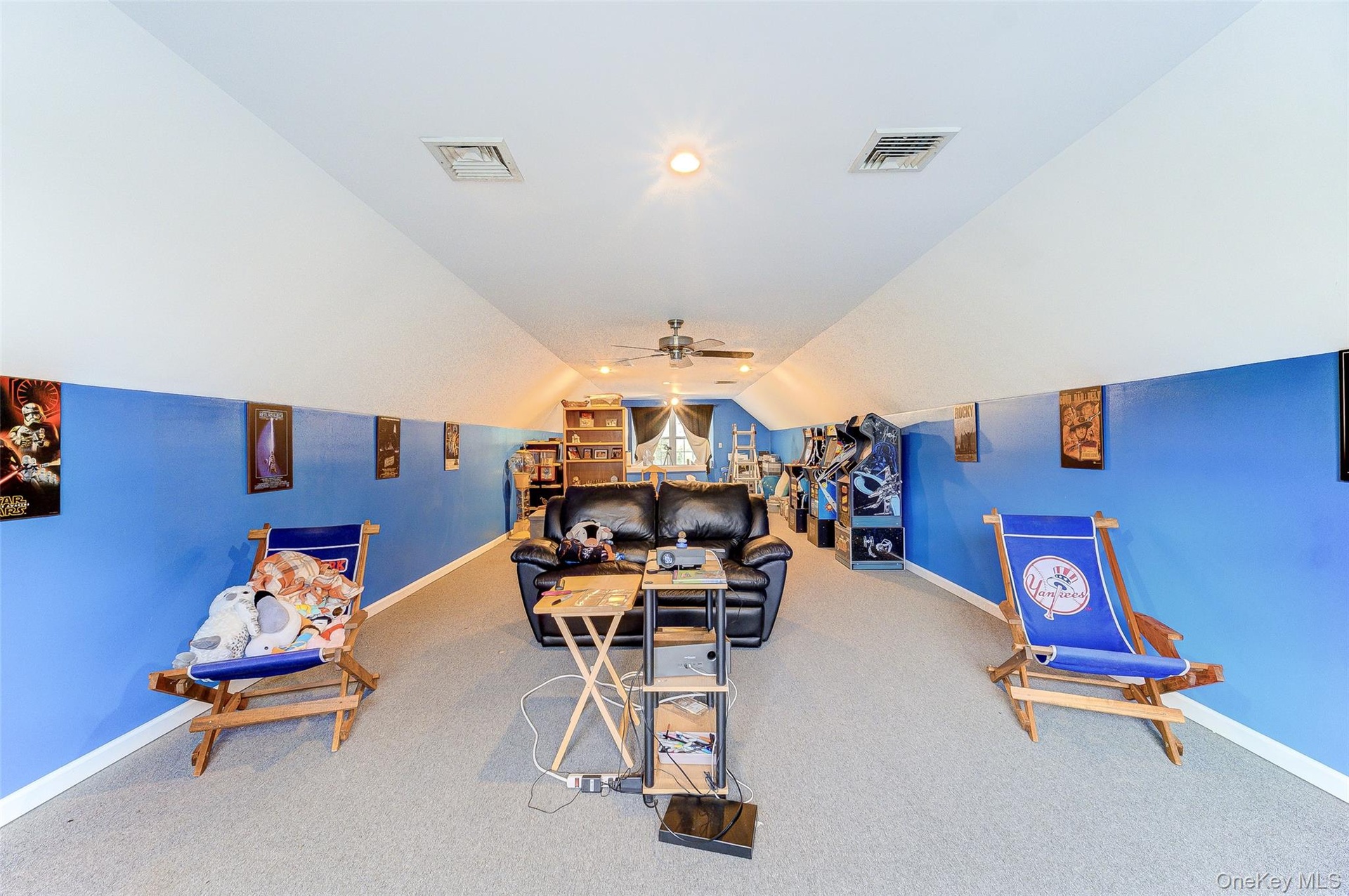 Walk up attic wth heat and AC. Perfect game/movie room