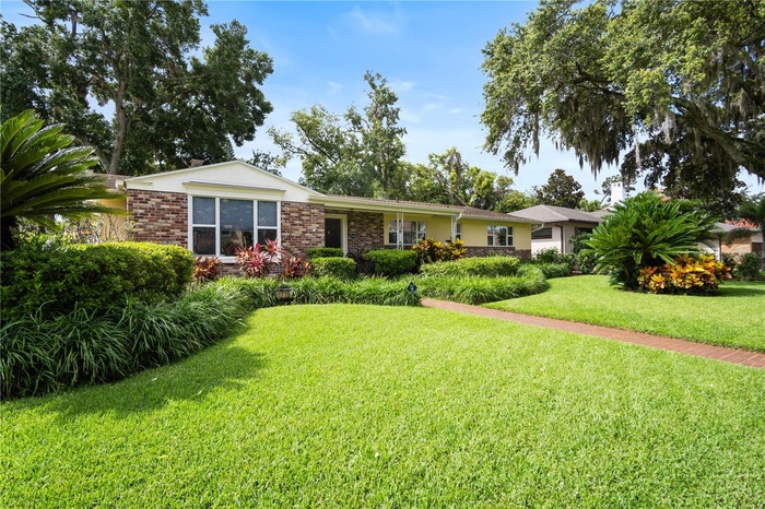 The landscaping adds to the curb appeal and charm with this home.