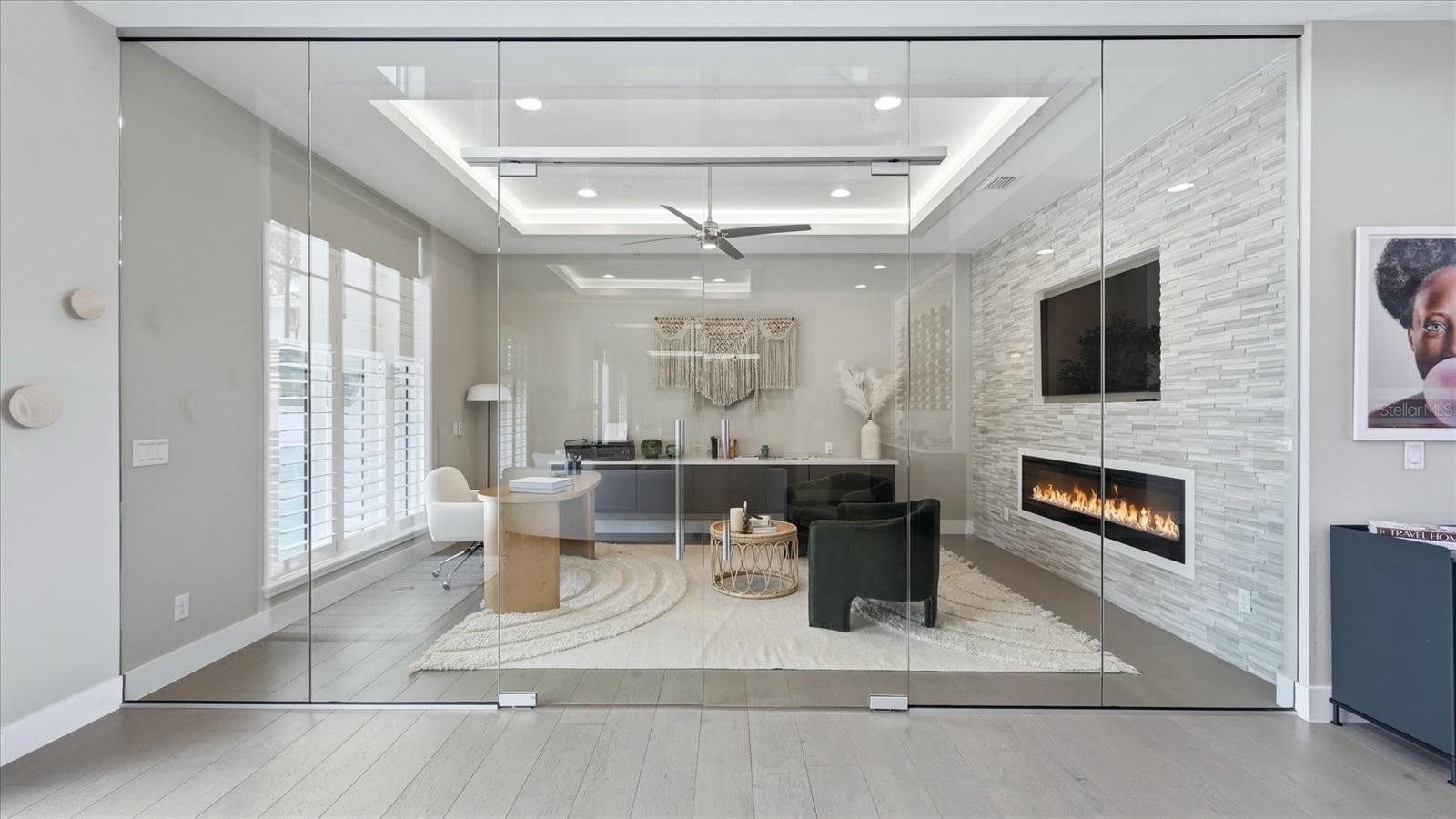 home office with glass wall