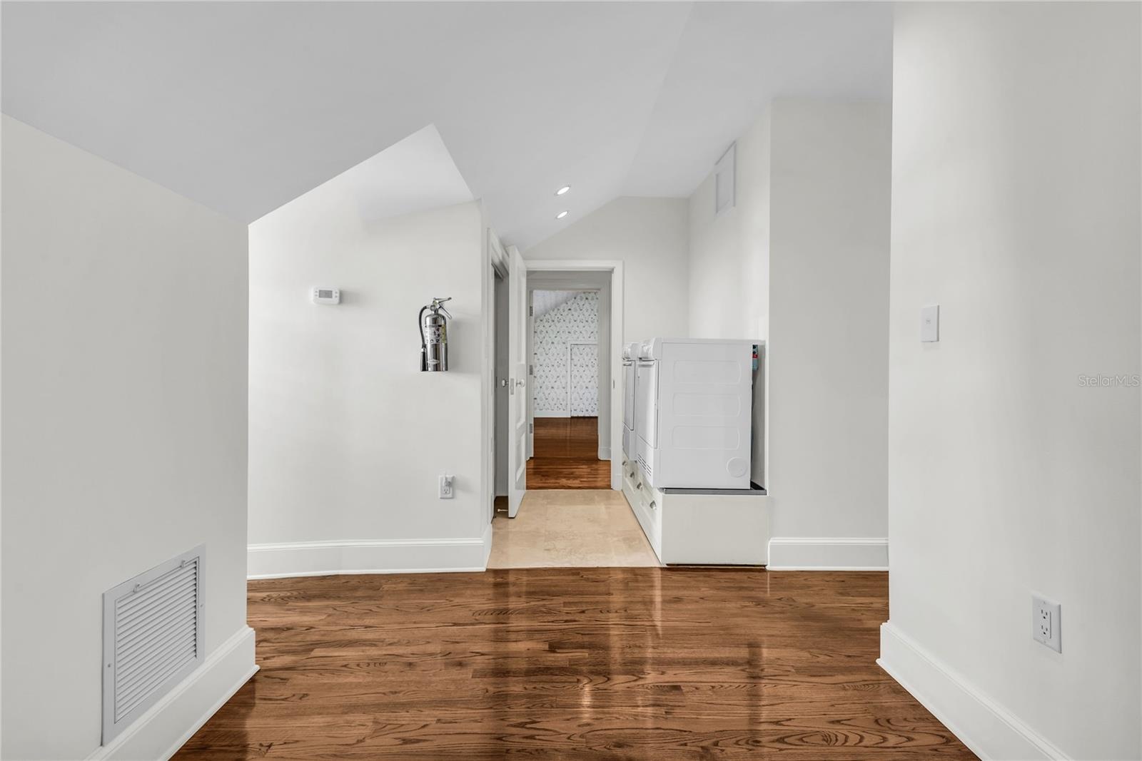 Original maid's quarters can be accessed off the primary suite or has an exterior entrance- includes bathroom and laundry
