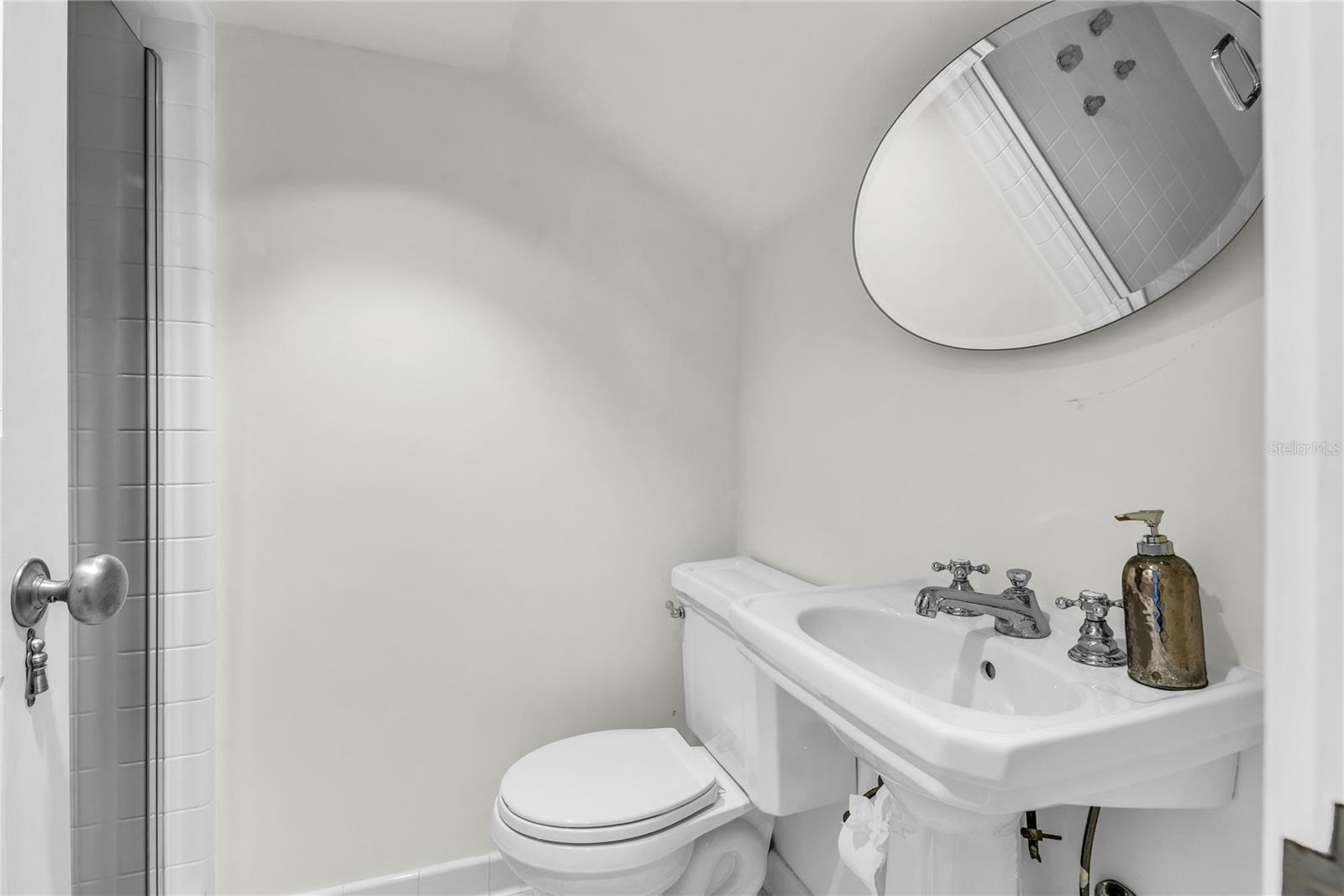 Original maid's quarters can be accessed off the primary suite or has an exterior entrance- includes bathroom and laundry