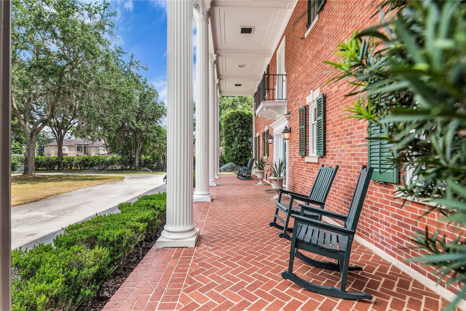 Charming front porch to enjoy the sprawling front yard