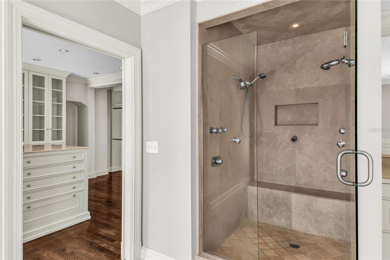 Primary suite with private balcony, huge en suite bathroom and walk-in closet