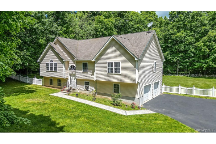 Welcome to 36 Front Street. Your rare private oasis in Mahopac.