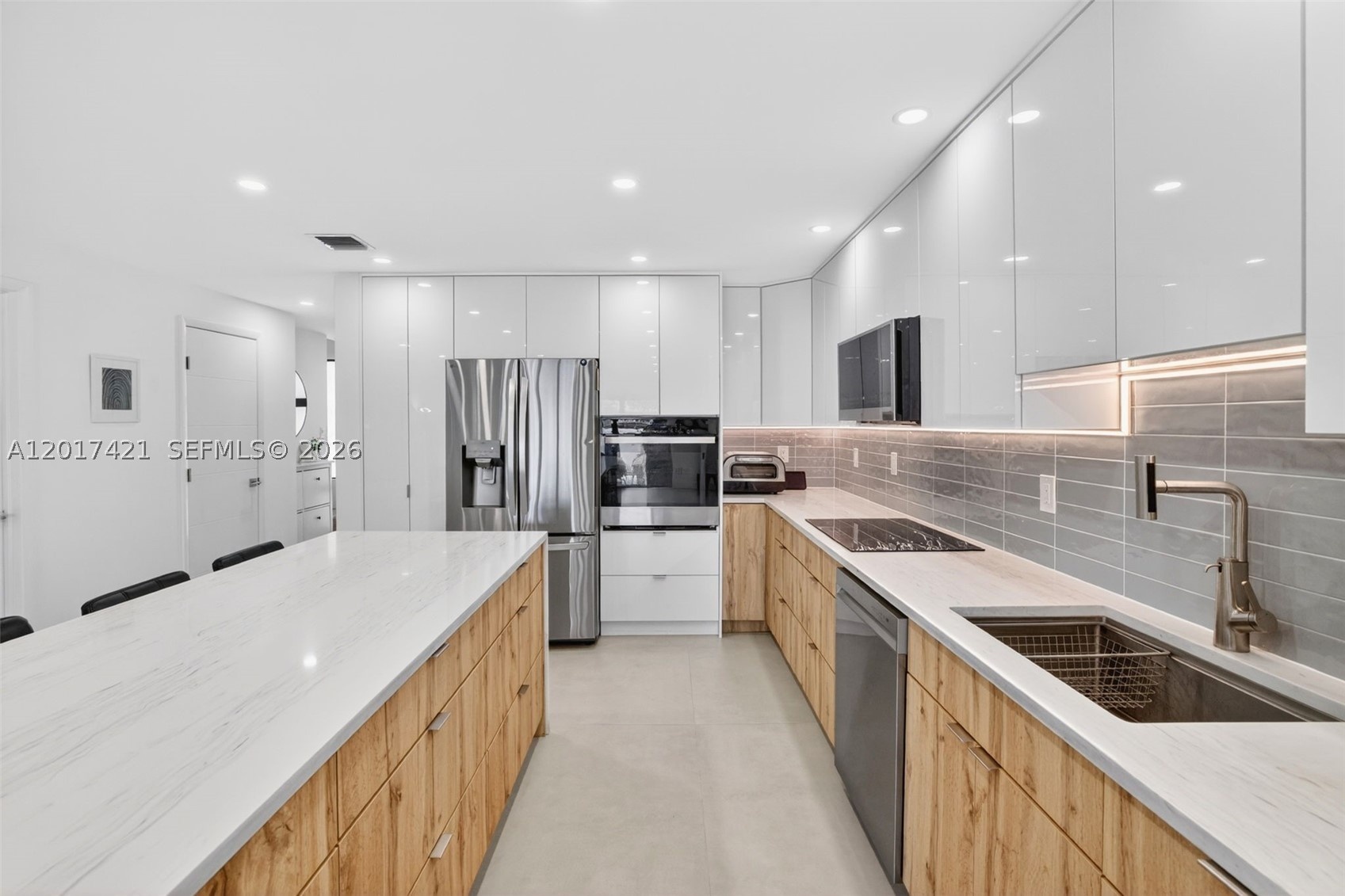 Oversized kitchen sink and tons of storage cabinets and drawers