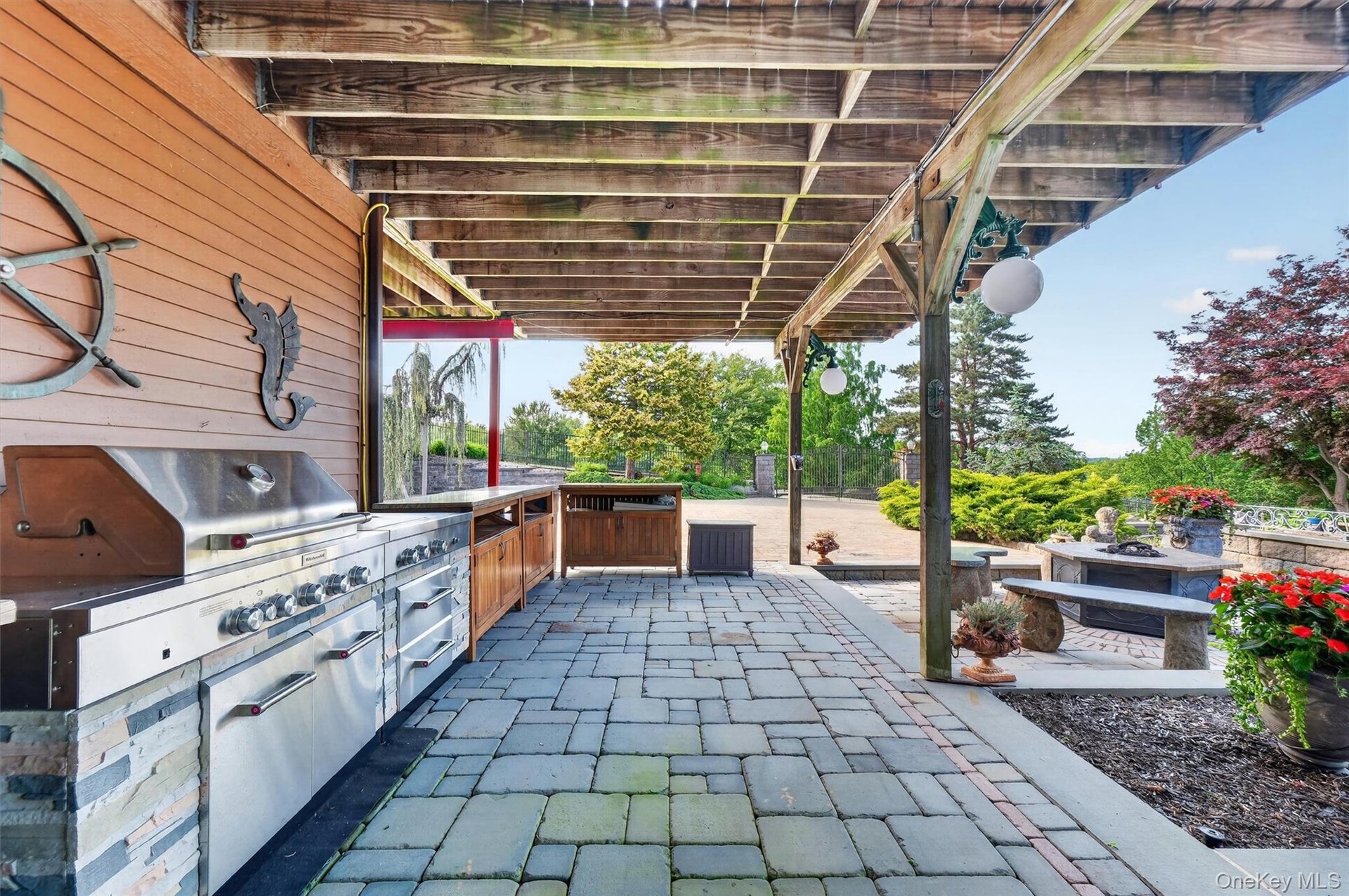 Hosting a pool party is a breeze with the expansive outdoor cookout space