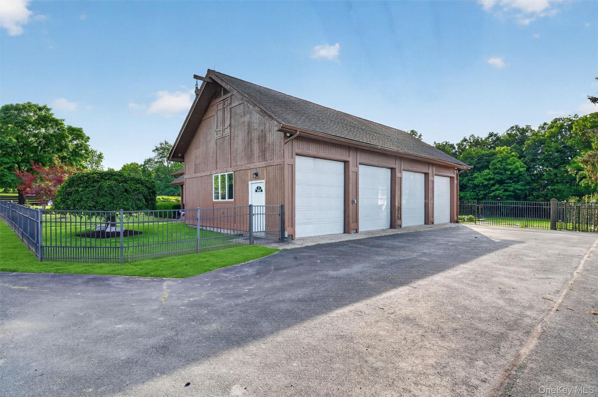 The 28x48 4 bay garage with workshop and loft is attached to the 2nd home.  Perfect for farm equipment or a hobby garage.