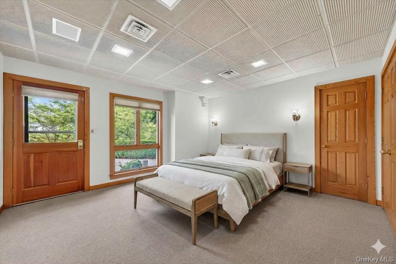 Direct access to the hot tub and pool deck from the lower level bedroom