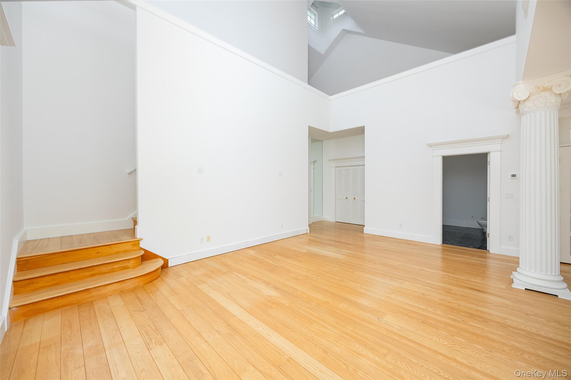 Primary Bedroom with staircase to loft