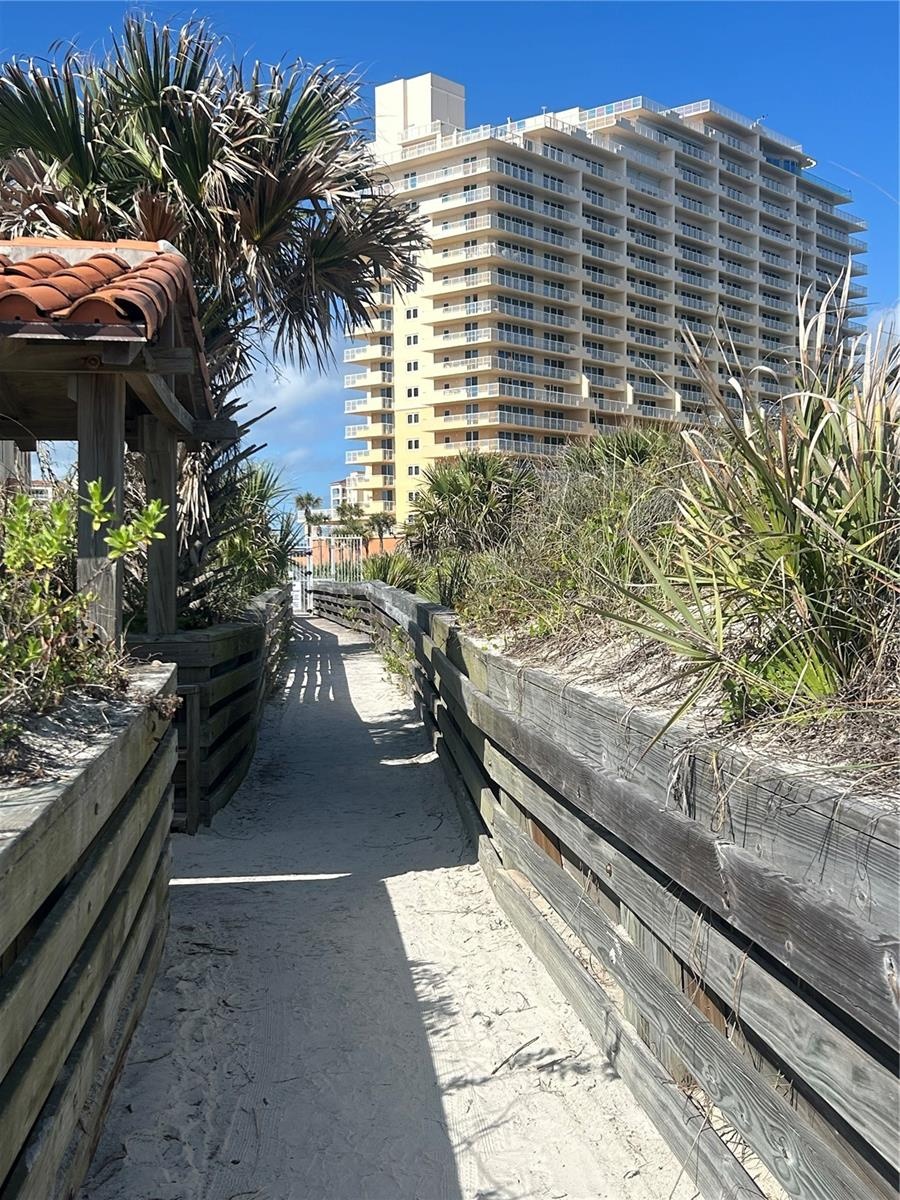 Private gated walkway to beach