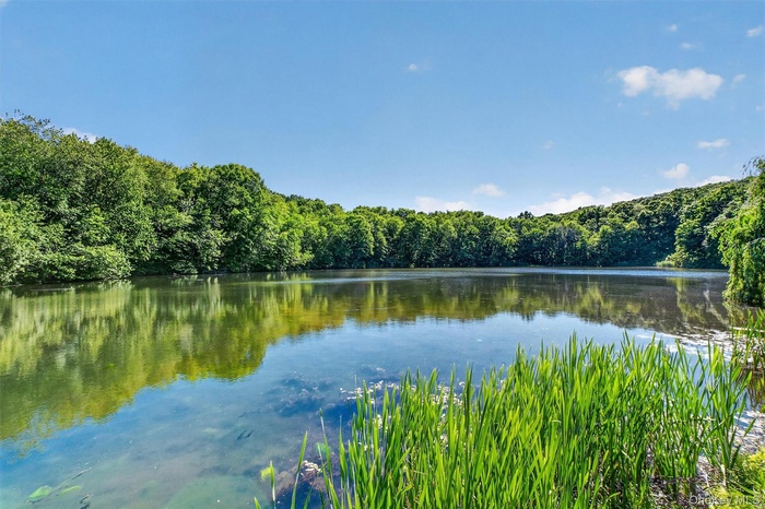 Featuring a stunning 5-acre private lake, 29-35 Bowen Court offers a rare combination of natural beauty, privacy, and investment potential.