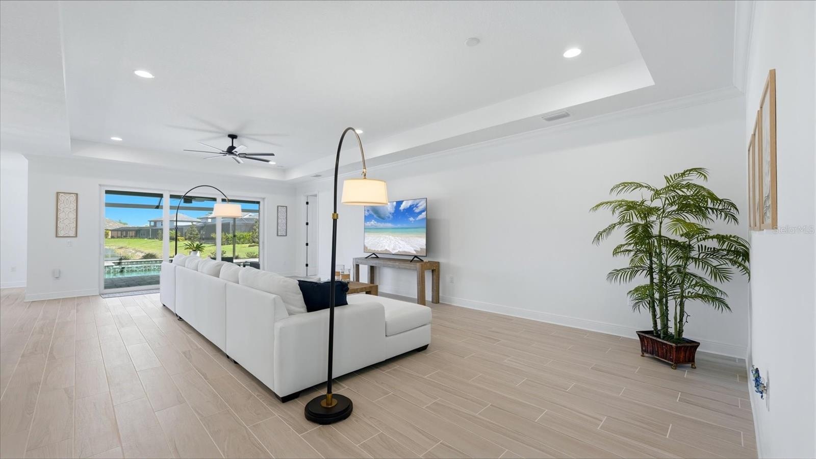 Open Living Space with Pool and Water Views!