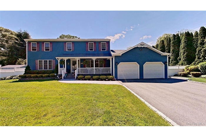 Welcoming curb appeal with LARGE Belgium block lined driveway!