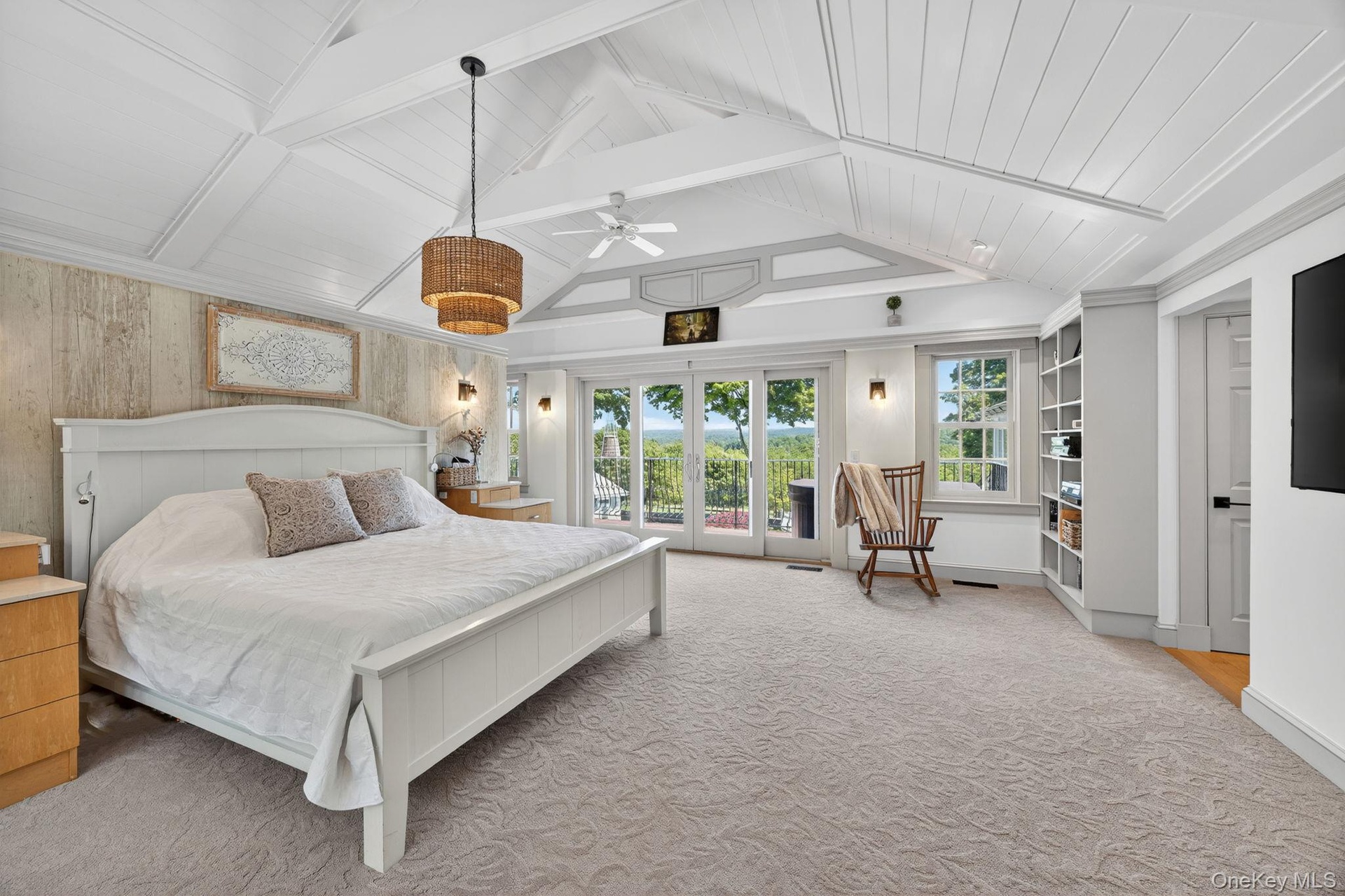 Priamry Suite with balcony overlooking pool area