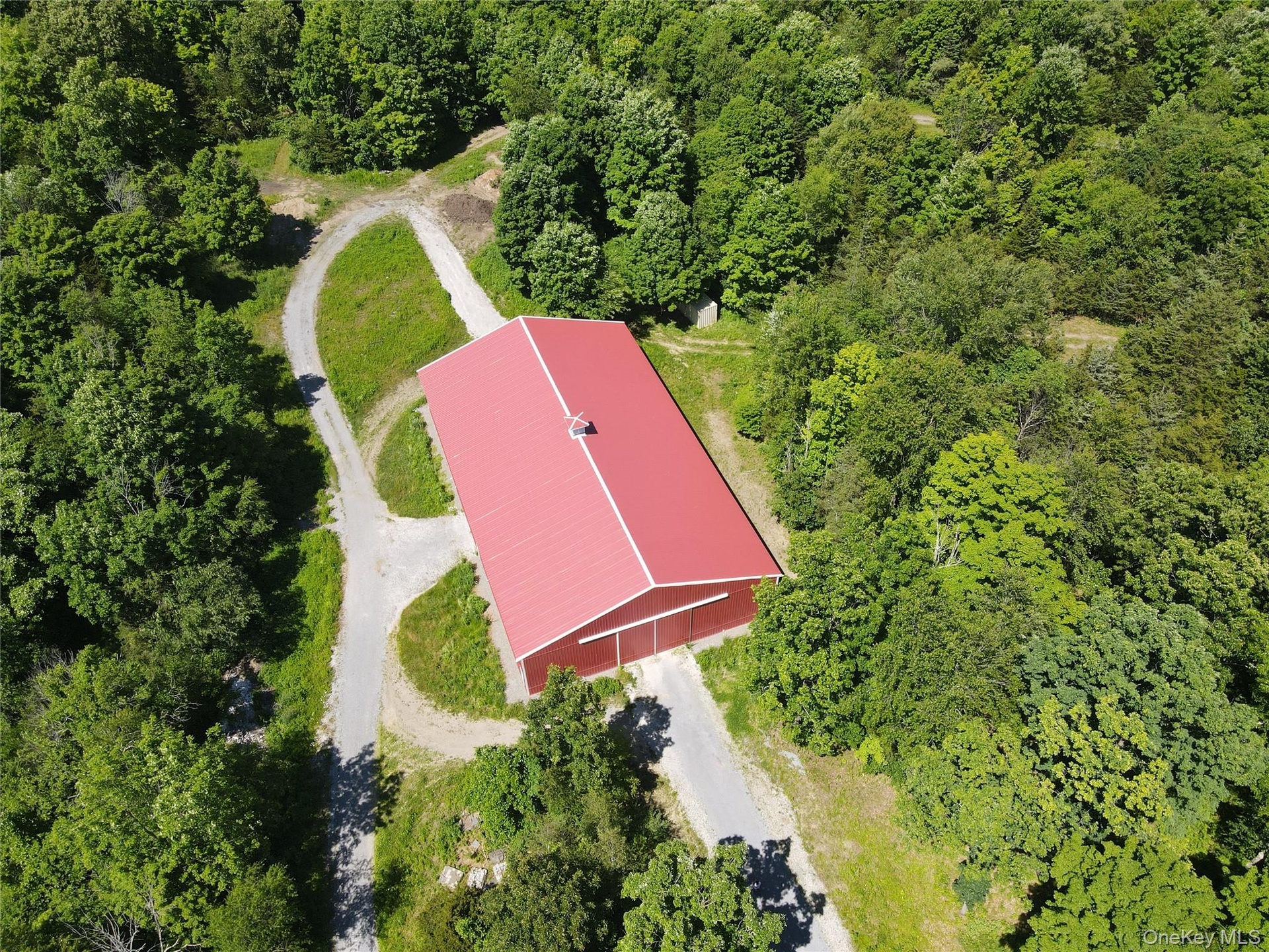 Large storage barn or possible indoor riding ring