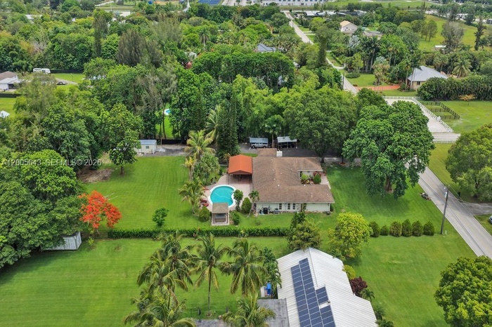 Home faces east. Lot's of mature shade trees.