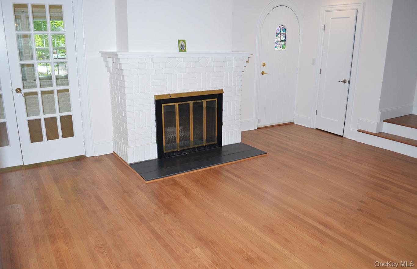 Living room with fireplace & hardwood floors