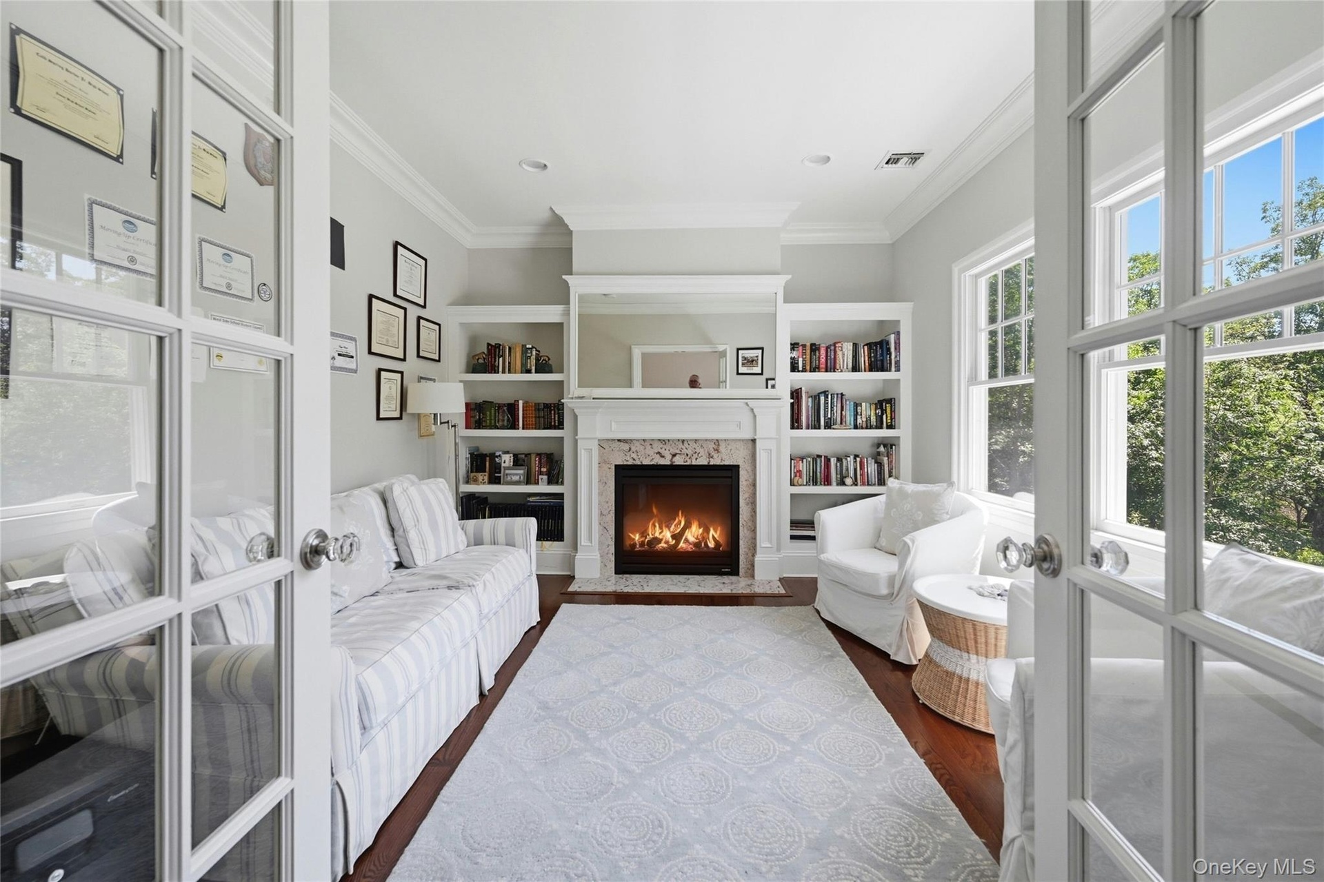 Sitting Room w Built In Cabinetry, French Doors, Fp Off of Primary Suite