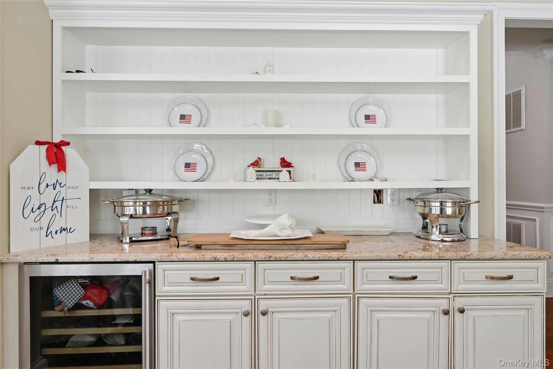 Kitchen w Built In Cabinetry and Wine Fridge