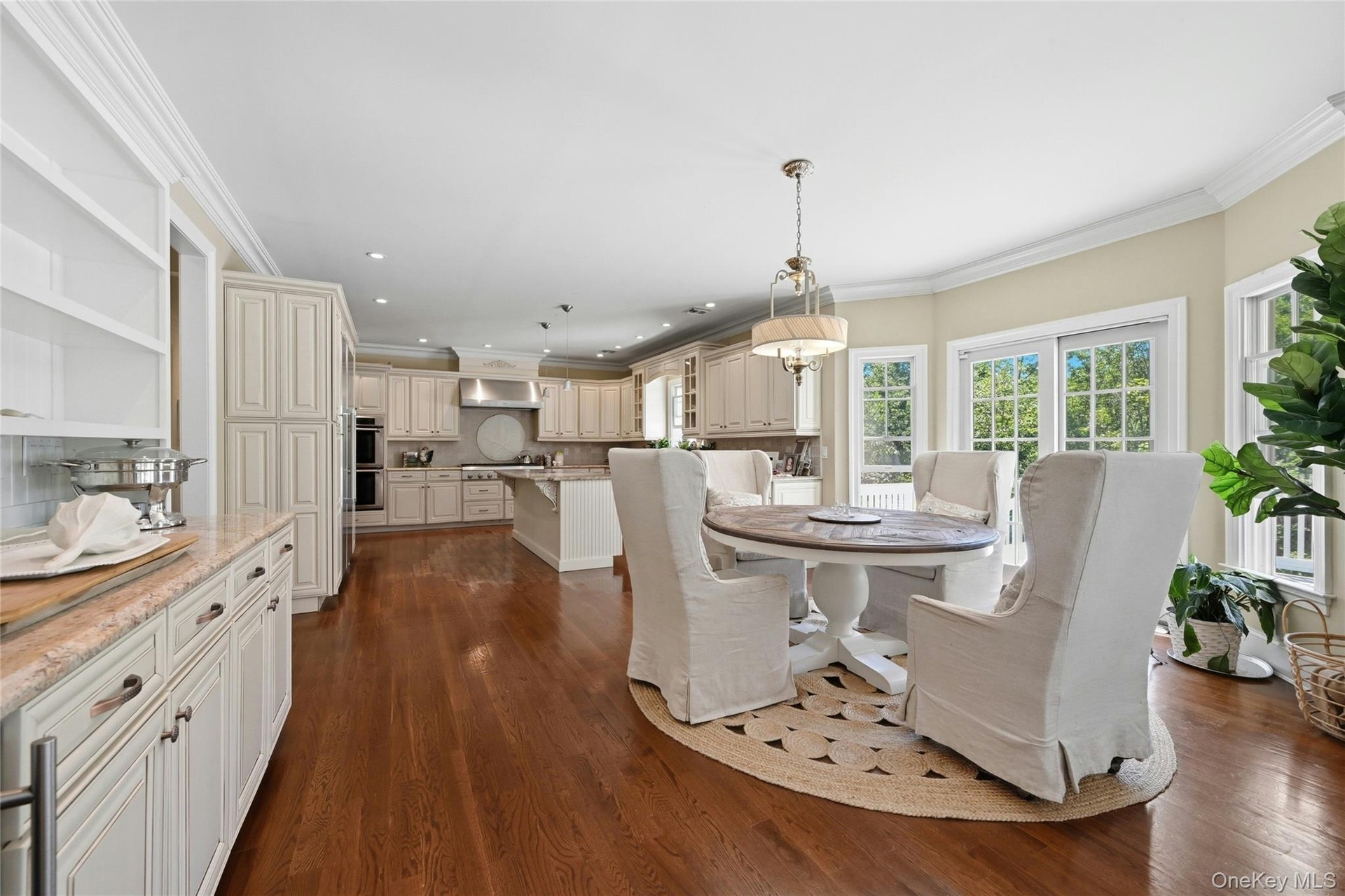Large Bright Kitchen with French Doors to Outside Deck and New Pergola